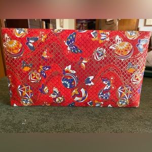 Japanese photo album,  colors are mainly red on the outside, with magnetic pages